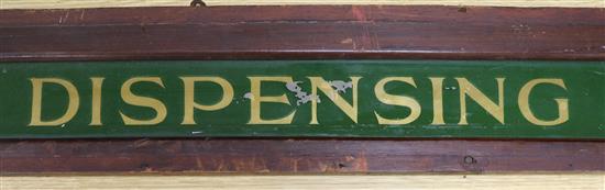 An early 20th century dispensing department sign length 180cm